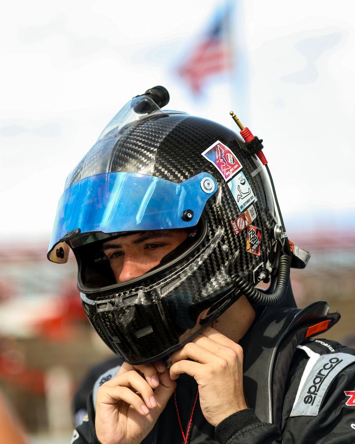 Jonah fastening his helmet